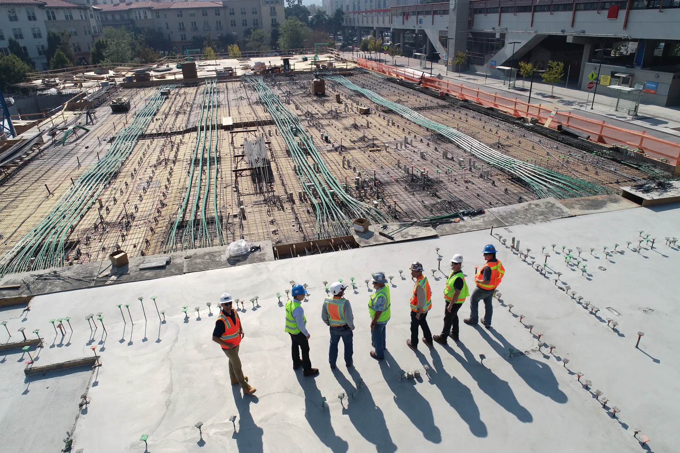 Construction team reviewing work on an active site